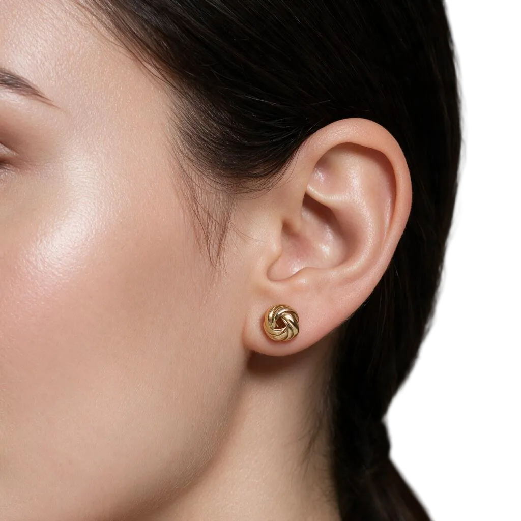Paire de boucles d’oreilles en or Nœud d’amour